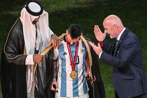 Lionel Messi offered $1 million for bisht he wore while lifting the ...