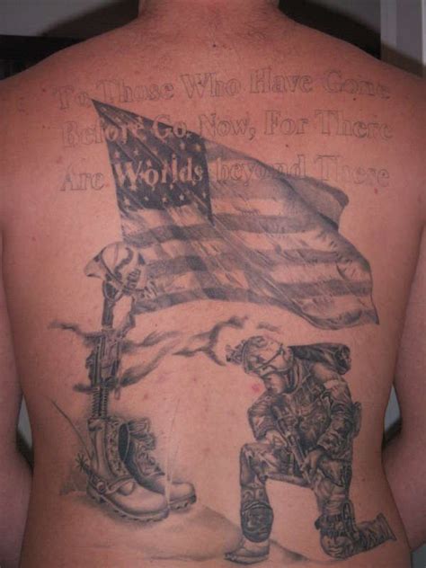 Soldier Kneeling At Cross Tattoo