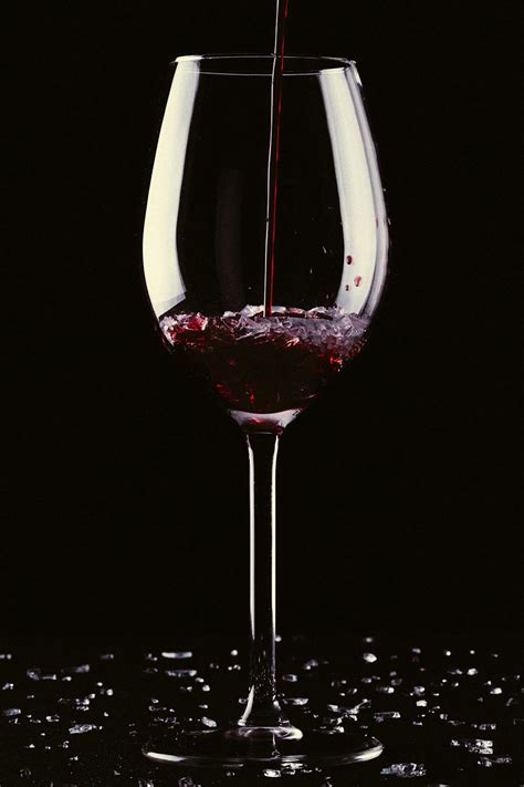 Red Liquid Poured Into Wine Glass · Free Stock Photo