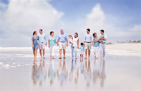 Family photo on the beach ... love the light blues and greens ... love the reflection on the ...