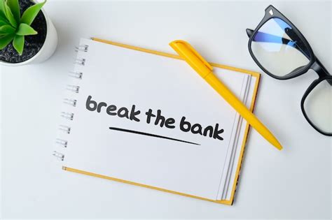 Premium Photo | Break the bank - english money idiom hand lettering