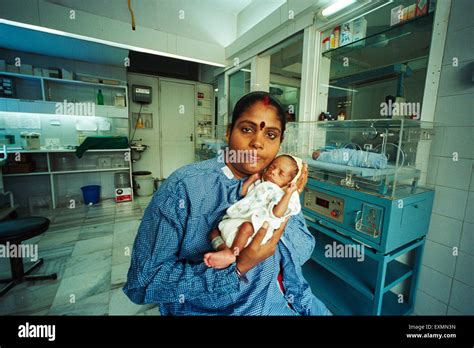 Woman with just born baby, Bombay, Mumbai, Maharashtra, India, Asia Stock Photo - Alamy