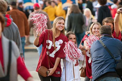 Female Alabama Fans Pose For Photo Outside Georgia Dome Stock Photo - Download Image Now - iStock