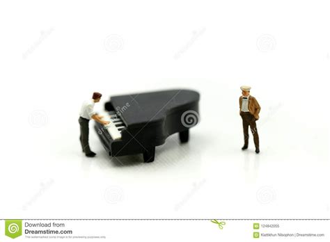 Miniature People : Man Play Mini Piano Using for Concept of Music and ...