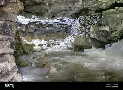 Karst cave. Cave in carbonate rocks, Visible layers of limestone, layered limestone Stock Photo ...