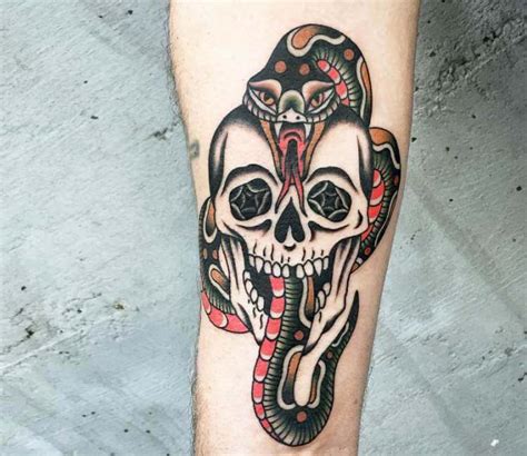 Traditional Skull And Snake Tattoo