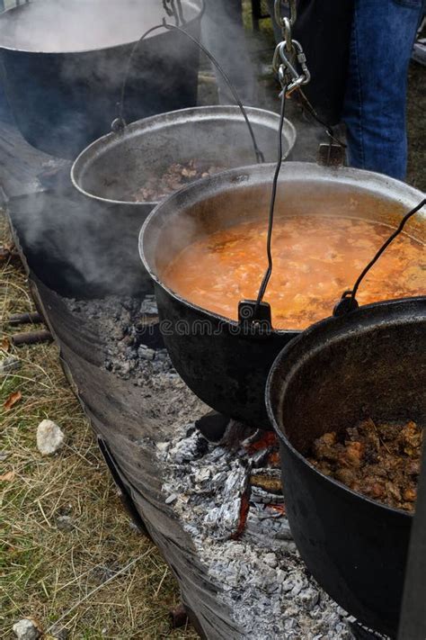 Very Large Cauldron Cooking Food during Campfire. Cooking in a Pot on ...