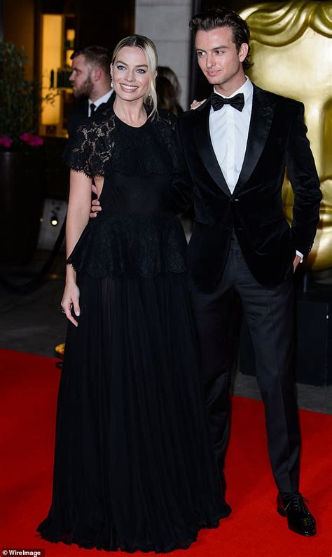 Margot Robbie takes her brother Cameron as her date to the BAFTAs ...