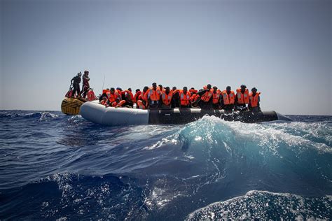 Dozens of migrants die after boat breaks apart off southern Italy