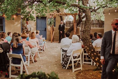 The wedding guests are seated for the outdoor wedding at La Posada de ...