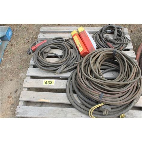 Air arc, welding cable, welding whips oxy acetylene hose x 2, 220 extension cords, carbon rods, glov