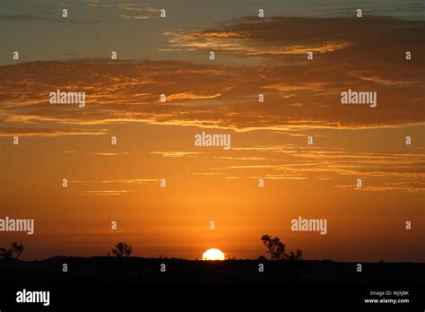 Australian outback sunset Stock Photo - Alamy