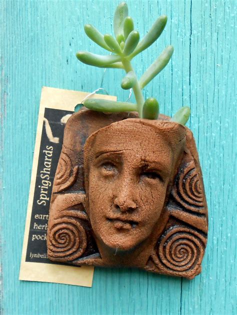 Pretty little clay pocket for herb springs Polymer Clay Figures, Polymer Clay Animals, Polymer ...