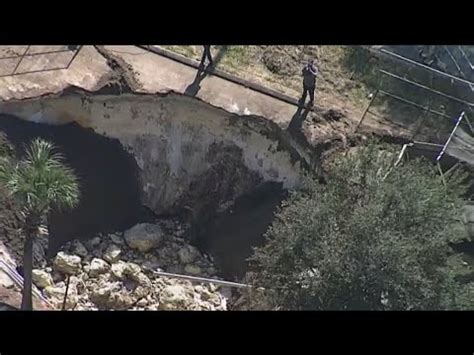 Pasco County sinkhole reopens, continues to grow - YouTube