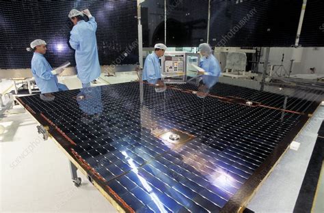 Satellite solar panels construction - Stock Image - C001/4767 - Science Photo Library