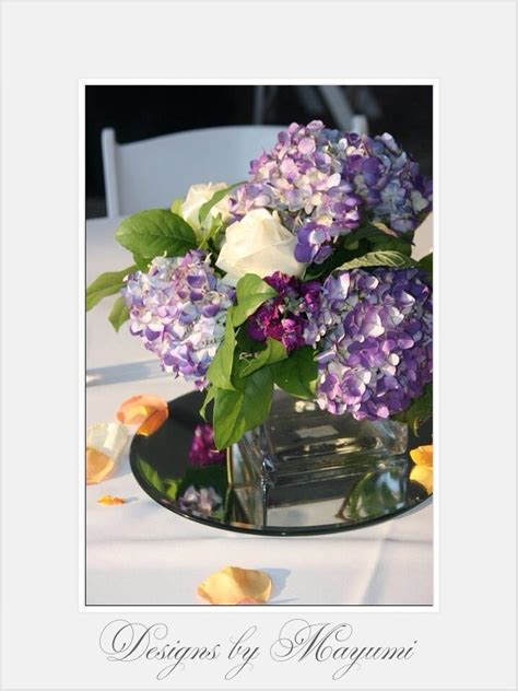 Pin by Melissa James on Flowers :) | Purple hydrangea centerpieces, Hydrangea centerpiece ...