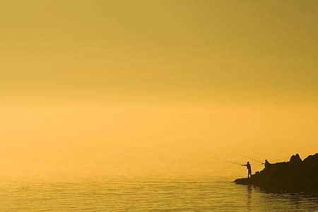 Royalty-Free photo: Man walking on gray sands | PickPik