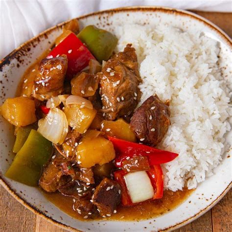 Slow Cooker Sweet and Sour Pork on plate with rice | Slow cooker recipes pork, Sweet and sour ...