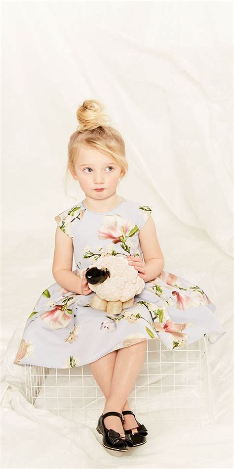 She’ll feel oh-so-grown up in the TOPSHIE dress from Ted. Adorned with ...