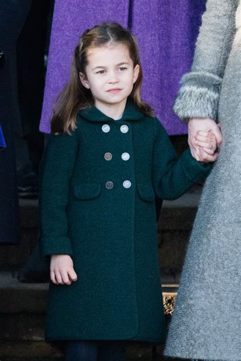 Princess Charlotte wore a dark green coat and black tights while ...