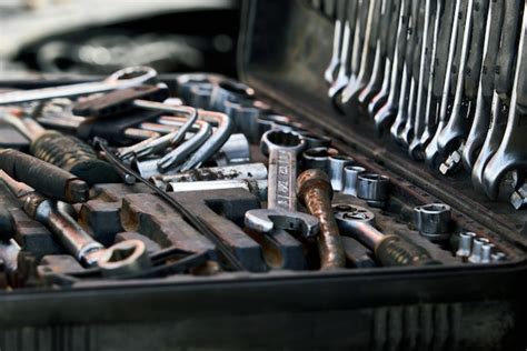 Premium Photo | Car mechanic tool set in auto repair shop