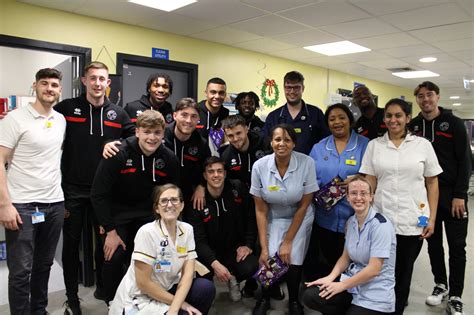 Walsall FC players bring festive cheer to patients - Walsall Healthcare NHS Trust