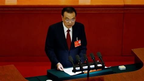 Chinese premier Li Keqiang praises new energy vehicle sector at industry event - CNA