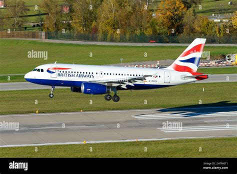 British Airways Airbus A319 aircraft landing at Zurich. Airplane G-DBCF ...