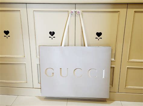 Gucci 2023 Holiday Collection Paper bag, Hobbies & Toys, Stationery & Craft, Art & Prints on ...