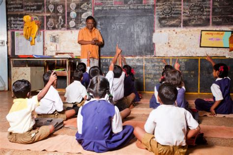 Male Teacher Teaching Students In A Rural School Of India Stock Photo - Download Image Now - iStock