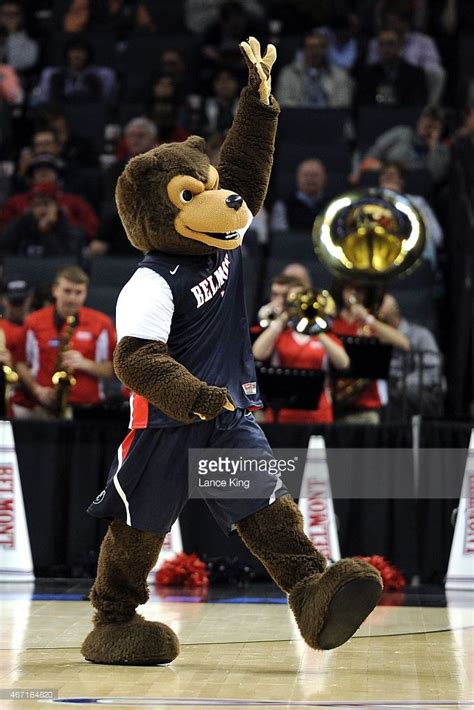 The mascot of the Belmont Bruins performs against the Virginia... | Belmont bruins, College ...