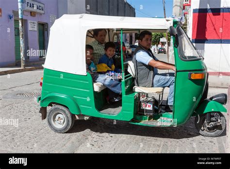 Tlacolula, Oaxaca; Mexico. Three-wheeled Moto-taxi and Passengers Stock ...