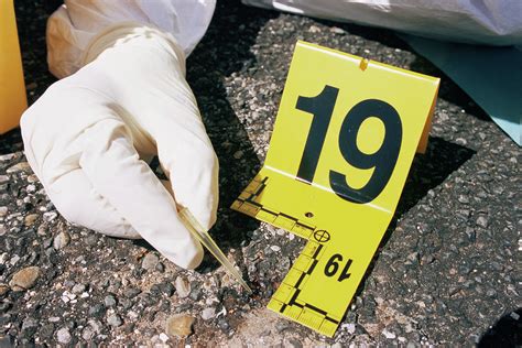 Forensics Officer Taking A Blood Sample Photograph by Philippe Psaila ...