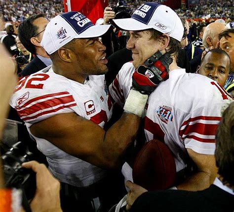 Michael Strahan and Eli Manning | Feb. 3, 2008 vs. Patriots in Super ...