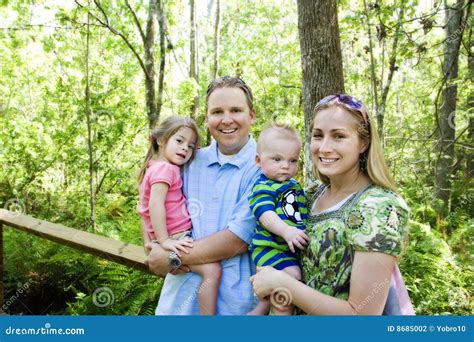 Smiling Family Outdoors stock photo. Image of parenting - 8685002