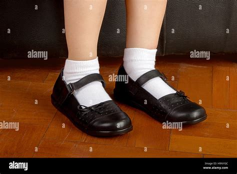 Young School Girl Student Wearing Black Shoes and White Socks Stock Photo - Alamy