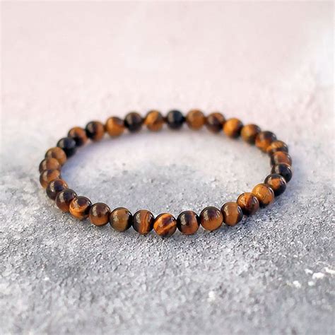 Tigers Eye Bracelet 6mm - Spirit Connexions | Tiger eye bracelet, Tiger eye beads, Trendy bracelets