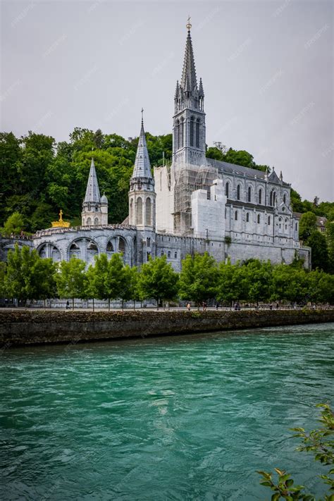 Premium Photo | View on the 19th century notre dame basilica of lourdes ...