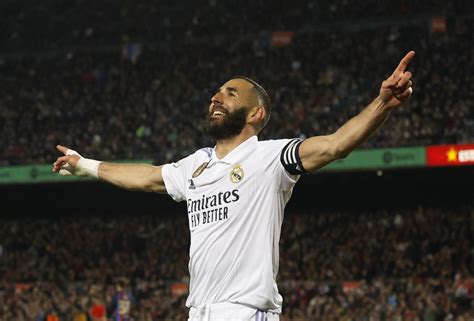 Barcelona stunned as Benzema hat-trick sends Real into Copa final | Reuters