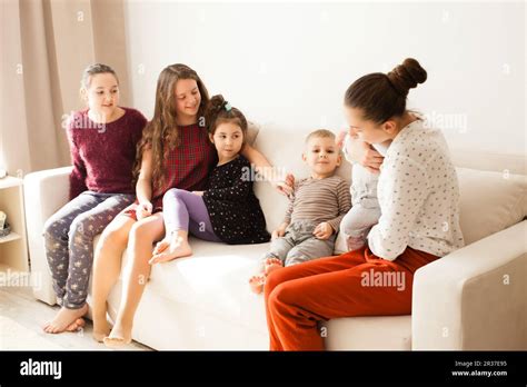 Big family of siblings Stock Photo - Alamy