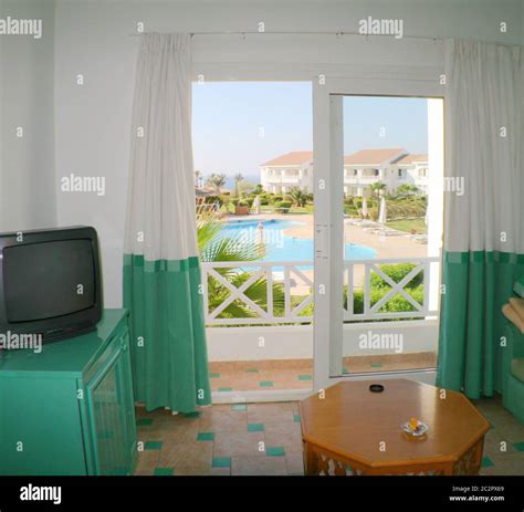 Resort hotel room. Pool view Stock Photo - Alamy