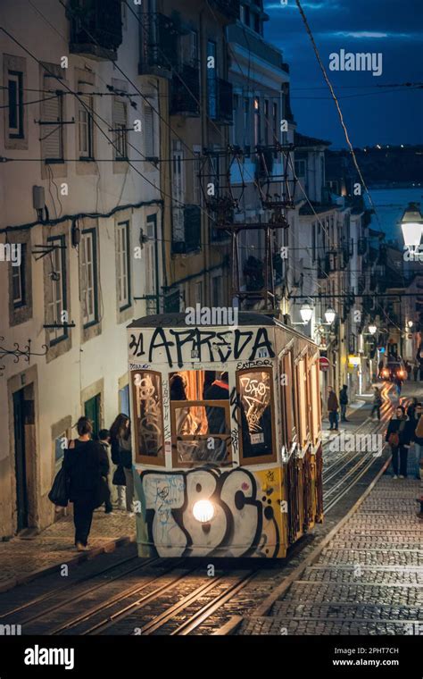 Old tram through the streets of beautiful Lisbon Stock Photo - Alamy