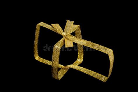 Gold ribbon with a bow stock photo. Image of black, gold - 16736186