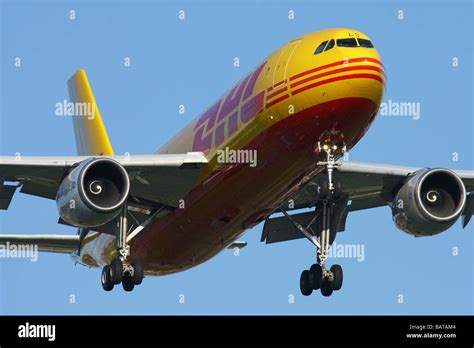 Cargo aircraft - Airbus A300 from DHL company landing on London Stock Photo, Royalty Free Image ...