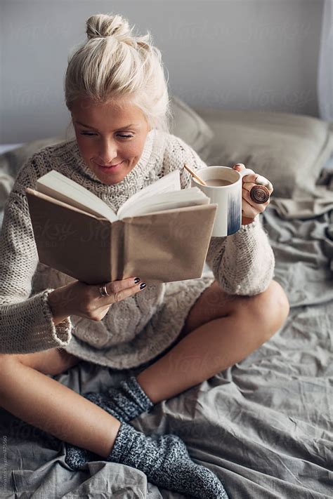 "Happy Woman Reading A Book And Having Coffee In Bed" by Stocksy ...