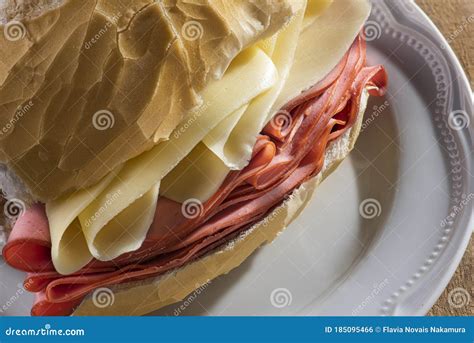 Traditional Mortadella and Cheese Sandwich on a White Plate and Wooden Table Stock Photo - Image ...