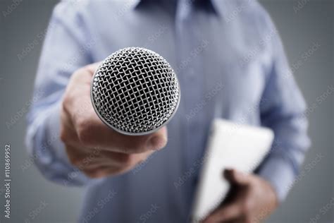 Interview with microphone Stock Photo | Adobe Stock