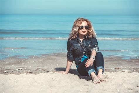 Young Woman Walking Alone on the Beach Stock Photo - Image of skin, loneliness: 34894212