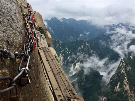 The Plank Walk to Heaven on Mount Huashan China. We googled "world's most dangerous hike" and ...