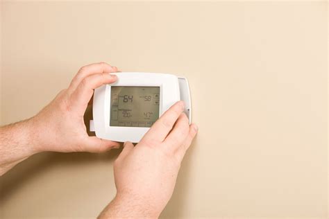 How To Replace Batteries In An Emerson Thermostat - HVACseer.com